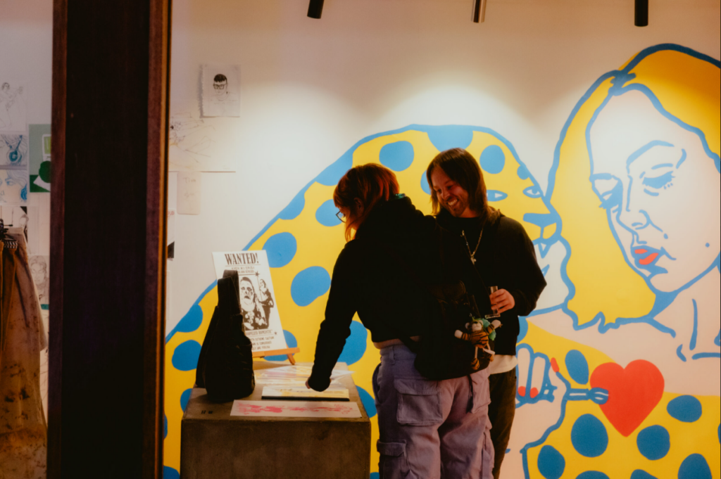 Pop-up space marketing strategy with customers engaging in a visually branded retail environment designed for social sharing