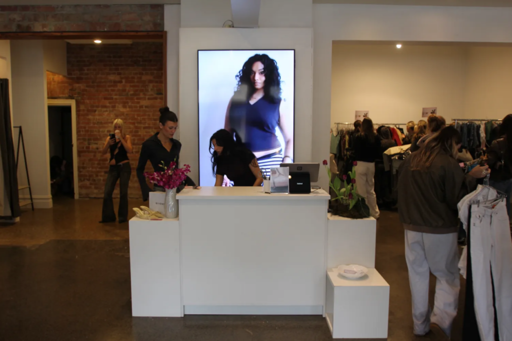 Retail space ROI metrics demonstrated through customer engagement and product interaction in a pop-up retail store
