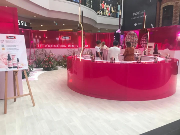 Swisse activation with a pink bar and product display