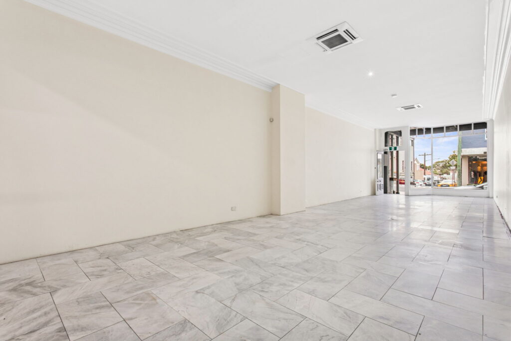 Light-filled pop up retail interior at 348 Darling Street, Balmain, with tiled floors and a glazed shopfront
